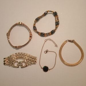 #390.  5 Piece Gold Toned Bracelet Bundle